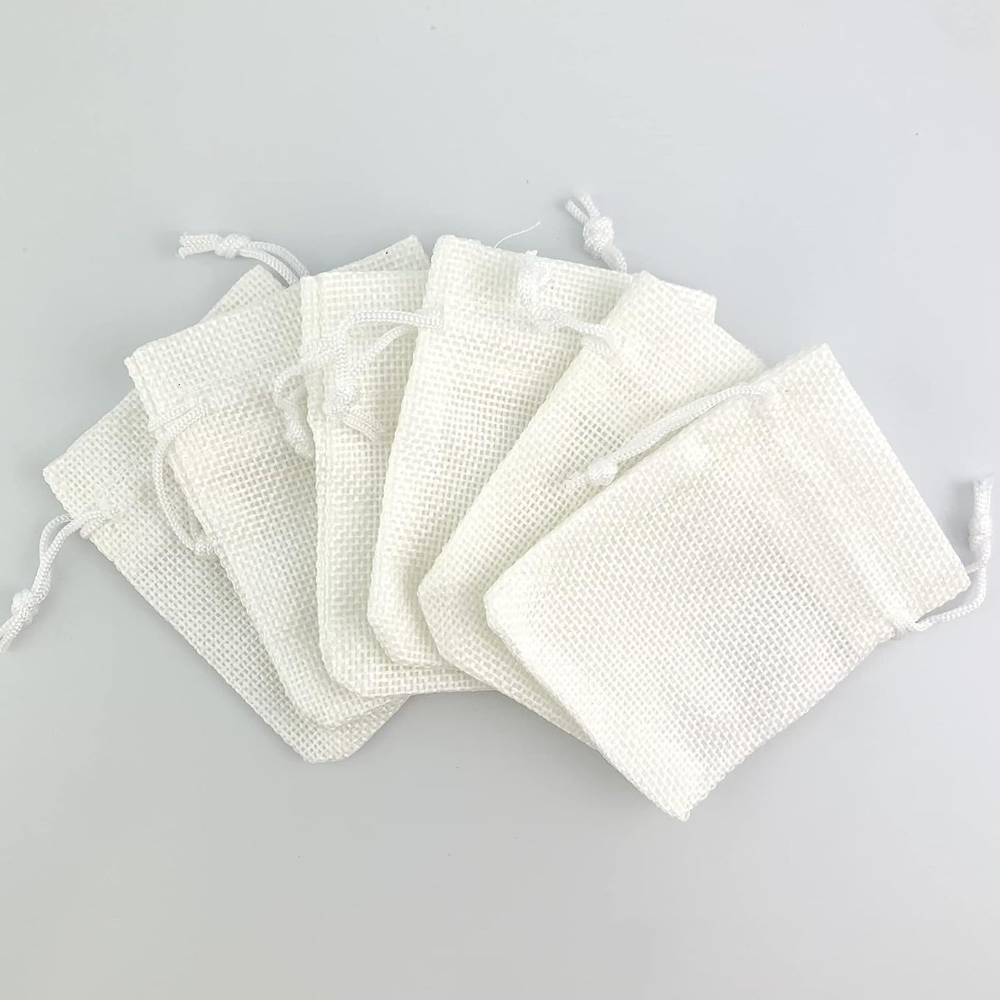 Palmhomee Pack Of 25 Burlap Gift Bags with Drawstring Linen Jewelry Pouches Wedding Hessian Jute Bags for Birthday Jewelry and Treat Pouches Party Wedding Favors Gift Art and DIY Craft (3.6x4.8 Inch, White)