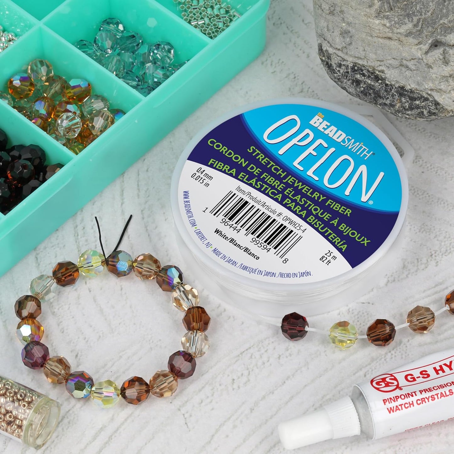 The Beadsmith Opelon Stretch Cord – Elastic Beading Fiber, White, 0.4 mm Diameter, 25 Meters (82 ft) Spool