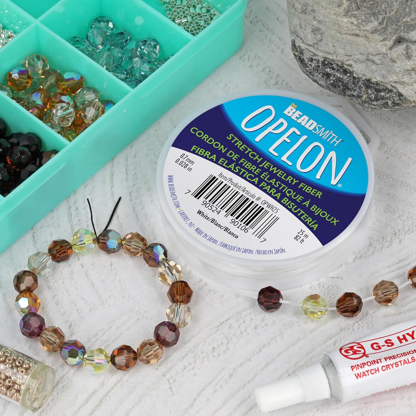 The Beadsmith Opelon Stretch Cord – Elastic Beading Fiber, White, 0.7 mm Diameter, 25 Meters (82 ft) Spool